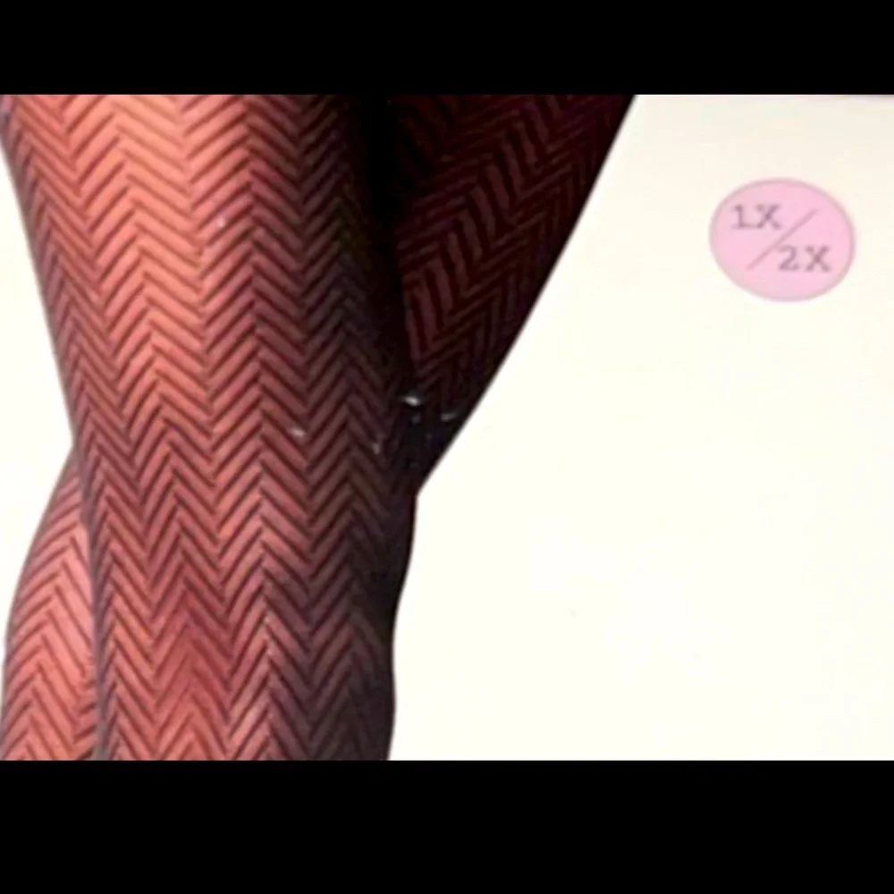 A New Day brand fashion tights in size 1x/2xl. Black W/Z Pattern 5ft-6ft 180-270